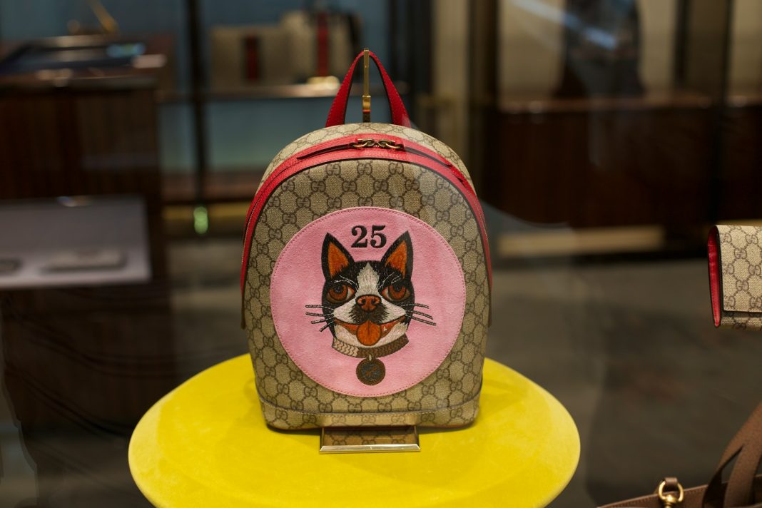 a purse with a picture of a cat on it